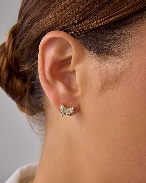 Bow-themed earrings | Gold