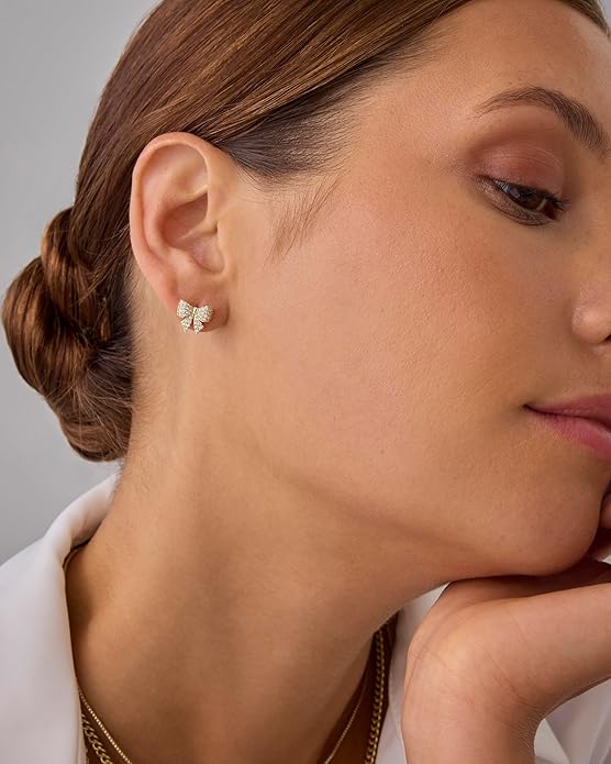 Bow-themed earrings | Gold