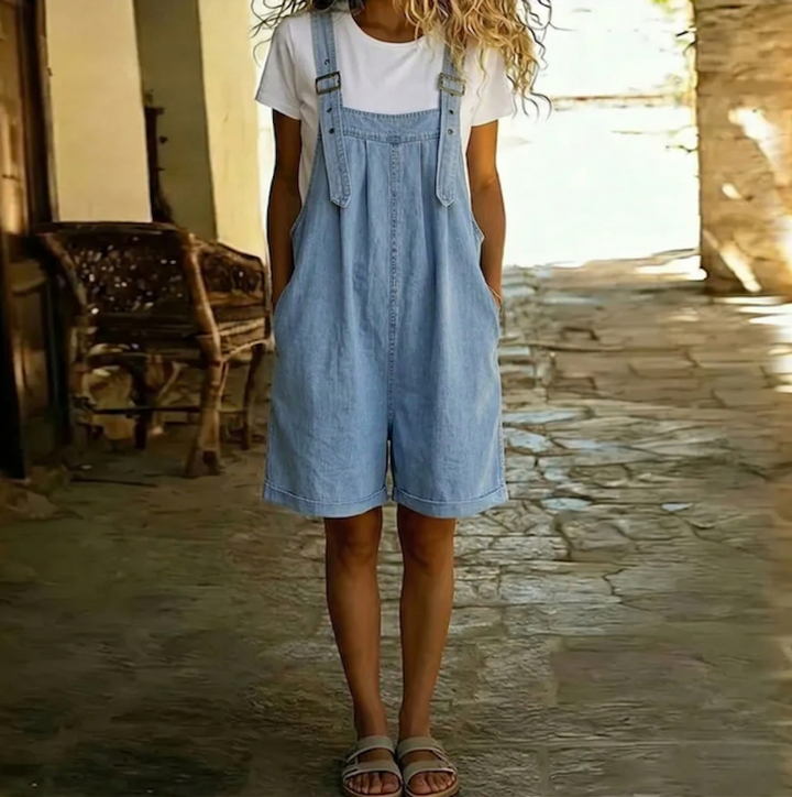 Clara | Short denim overall in light blue with a vintage washed finish