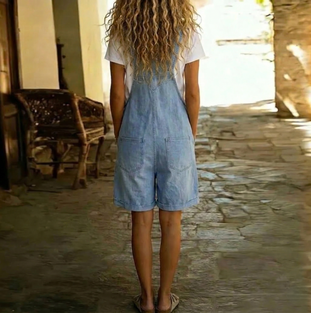 Clara | Short denim overall in light blue with a vintage washed finish