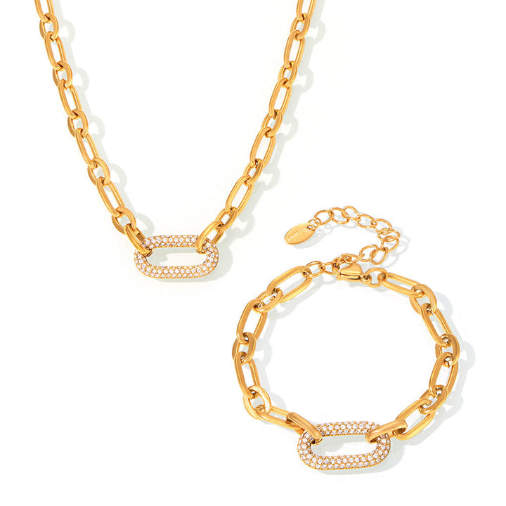 Massive jewelry set with chain link and pavé elements | Gold